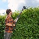 WG252E - Telescopic hedge trimmer with 20V battery